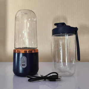 Petit presse-agrumes électrique portable Lame en acier inoxydable Smoothie automatique Machine à glace Tasse à jus - Product Image 1
