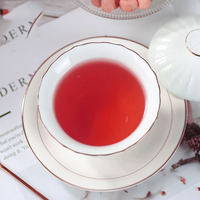 Thé en vrac sain sans sucre en sachets, mélange de fruits frais séchés et de thé noir à la fraise en boîte, vente en gros