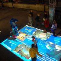 Système de projection interactive au sol à grand écran et haute précision