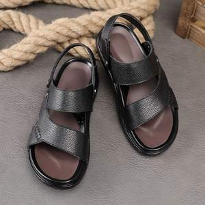 Sandalias de cuero genuino con tiras cruzadas, suela de goma antideslizante, casuales de verano para hombre, con punta abierta y hebilla. - Product Image 1