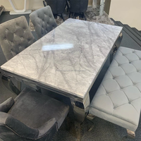 Ensemble de Salle à Manger 6 Places avec Plateau en Faux Marbre, Pieds en Acier Inoxydable et Base Argentée