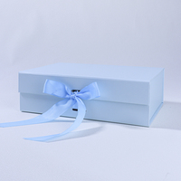 Boîte cadeau rigide pliable bleue sur mesure pour économiser de l'espace avec fermeture magnétique et ruban de fermeture