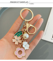 Porte-clés fleur de cerisier coréenne Sakura en émail pastel avec perle, pour femmes et filles, breloque de sac, pendentif de sac à dos, cadeau
