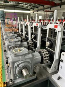 Haute vitesse 40 m min aucun arrêt coupe 1219 rouleau <span class=keywords><strong>de</strong></span> feuille <span class=keywords><strong>de</strong></span> toiture en métal formant la machine tuile <span class=keywords><strong>de</strong></span> <span class=keywords><strong>toit</strong></span> faisant la machine avec des boîtes <span class=keywords><strong>de</strong></span> vitesse - Product Image 4