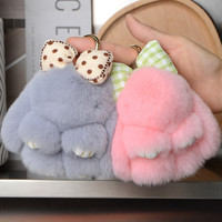 Nouveau design, mini porte-clés en fourrure de lapin Rex véritable de 12 cm, adorable porte-clés en peluche moelleux avec nœud, charme de lapin pour les femmes, accessoires de sac et jouets cadeaux