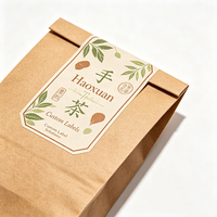 Étiquettes d'emballage de thé personnalisées Haoxuan, fabriquées à la main, en papier kraft gaufré, imprimées à l'encre écologique, autocollantes pour les paquets de thé
