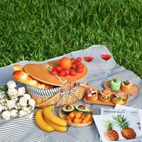 Petit panier de pique-nique en jonc de mer avec couvercle et poignées Cible Grand panier en osier Oem Vente en gros de paniers en vrac Basquet Concept Panier à vélo