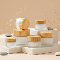 Pot en verre de luxe vide de 30g, 50g, 100g pour masque facial, crème capillaire, avec couvercle en bambou pour emballage de produits de soin de la peau