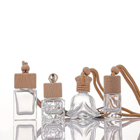 Vente en gros de bouteille de désodorisant pour voiture bouteilles de diffuseur de parfum pour voiture bouteille en verre avec pendentif de parfum d'aromathérapie d'huile essentielle