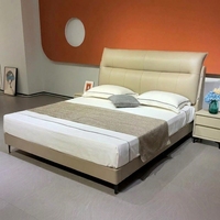 Cadre de lit moderne minimaliste beige en cuir véritable avec tête de lit capitonnée pour chambre principale