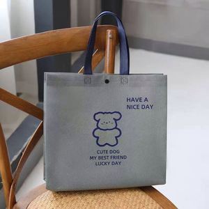 Sac de courses pour enfants en non-tissé enduit imperméable, bleu, motif dessin animé, avec bouton personnalisé - Product Image 3