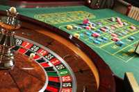 Fabricants d'accessoires de jeux de casino Vente chaude Roue de roulette en bois de 32 pouces de diamètre pour casino 4 jeux de table