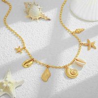 Collier de mode pour femme en cuivre, avec étoile de mer dorée, coquillage et pierre naturelle, style océan, pour soirée, été et plage