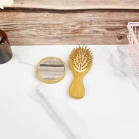 Brosse à cheveux portable en bambou avec coussin d'air, mini peigne de massage de voyage avec miroir intégré pour les soins capillaires quotidiens - Vente en gros usine