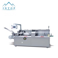 Machine d'emballage automatique de cartons pour capsules de café