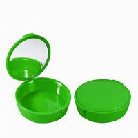 Boîte de rangement orthodontique en plastique ronde avec miroir pour appareils dentaires et gouttières, personnalisable avec logo, pour usage quotidien en clinique – Vente en gros