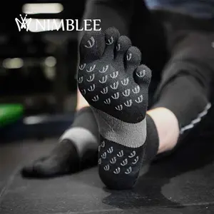 Chaussettes de sport en coton personnalisées pour femmes à cinq doigts et à 5 orteils chaussettes antidérapantes pour le yoga et le pilates avec logo personnalisé