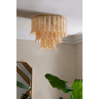 Plafonnier en verre Plume, hauteur réglable, longue suspension ronde en fer doré