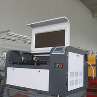 Machine de gravure laser CO2 portable refroidie par eau 6040 4060 50W 60W 80W 100W avec composants HIWIN et contrôle Ruida pour métal, bois, caoutchouc, IA
