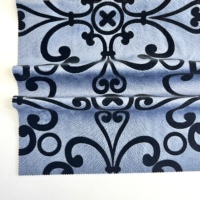 Tissu en polyester tricoté à la chaîne floqué à motifs floraux ornés pour la tapisserie de canapé, les rideaux et la décoration intérieure