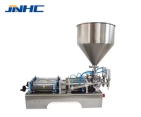 Machine de remplissage automatique commerciale à double tête de 50 à 500 ml pour boissons, miel, beurre de cacahuète, crème, shampoing, à entraînement pneumatique