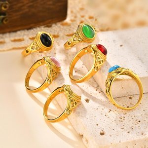 Anillo vintage de acero inoxidable chapado en oro para mujer, con cabujón ovalado de piedra natural multicolor y marco hueco tallado. - Product Image 3