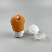 Fabricant de bouteille en silicone de 38ml pour crème shampooing lavage à la main bouteille en silicone à presser portable emballage cosmétique usine