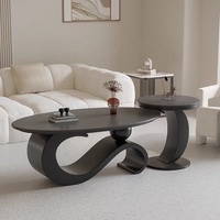 Table basse simple et moderne à vent en crème pour personnes âgées vivant dans de petits appartements Nouvelle combinaison de table à thé de luxe