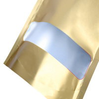 L'or mat tiennent des sacs de poche avec la serrure de fermeture éclair et la fenêtre claire pour l'emballage alimentaire