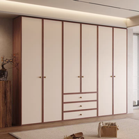 Armoire à portes battantes en placage de bois, style Mid-Century, avec blocs de couleur et lignes épurées, poignée métallique, pour chambre à coucher