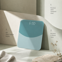 Balance de salle de bain numérique moderne vert turquoise en verre trempé avec affichage LED dissimulé pour pesée personnelle précise à domicile Pro