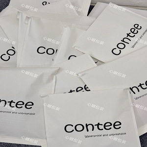 Bolsa de papel para envíos Xin Yue Clothing Express, bolsa de correo autoadhesiva de material compuesto tejido para camisas y camisetas. - Product Image 2