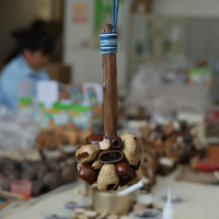 Rope Handle Seed Shell Hand Shaker Natural Nut Shell Rattle for Folk Music World Music and Hand Percussion