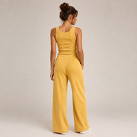 Ensemble deux pièces vintage pour femme en jersey de coton, avec haut ajusté jaune sans manches et pantalon large, personnalisable avec votre marque privée