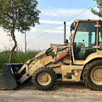 Chargeuse-pelleteuse d'occasion 8,2t avec bras de terrassement arrière, prête pour les chantiers de construction à l'étranger