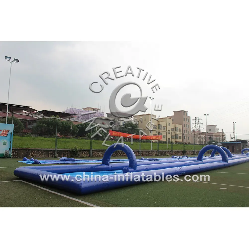 कस्टम लंबे Inflatable शहर स्लाइड रोमांचक शहर डबल लेन स्लाइड गीला स्लाइड एन पर्ची