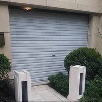 Porte de garage à enroulement électrique à grande vitesse au design moderne avec glissière panoramique et fonction antivol pour les commerces