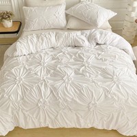 Parure de lit de luxe nordique blanche en polyester, taille King, personnalisée, avec housse de couette unie chic à fleurs froncées pour hôtel (vente en gros)