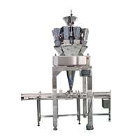 Machine d'emballage automatique de plateaux alimentaires collants avec peseuse multi-têtes