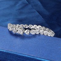 Pulsera de tenis de latón con circonita cúbica en forma de corazón, engaste de púas, cierre de seguridad, joyería para mujer al por mayor