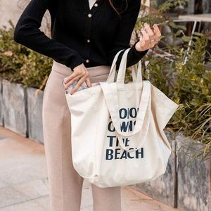 Bolsas de Compras de Lona de Algodón Blanca con Logotipo Personalizado Reciclado Promocional al por Mayor, Bolsas de Mano con Impresión de Letras para Estudiantes Universitarios - Product Image 5