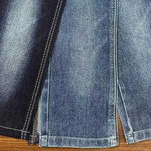 Tissu en denim sergé brut extensible tissé Lizhi XH6085W pour <span class=keywords><strong>jeans</strong></span> garçons et filles, vendu <span class=keywords><strong>au</strong></span> mètre - Product Image 1