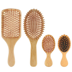 Vente en gros OEM Logo personnalisé Air Paddle Massage du cuir chevelu démêlant brosse à <span class=keywords><strong>cheveux</strong></span> en bois ensemble pour <span class=keywords><strong>cheveux</strong></span> <span class=keywords><strong>bouclés</strong></span> - Product Image 1