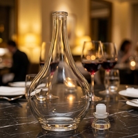 Bouteille de brandy en verre cristallin de 700 ml en gros d'usine avec bouchon en plastique, bouteille de liqueur, whisky, vodka, spiritueux personnalisée