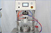 Machine automatique de vissage et de bouchage sous vide à quatre postes pour bouteilles/bocaux en verre