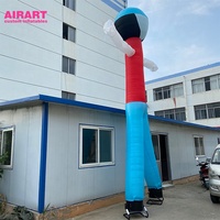 Figure de scène rouge gonflable, danseur d'air gonflable décoré d'émoticônes pour la publicité en plein air