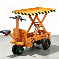 Chariot élévateur à ciseaux hydraulique mobile électrique pour la manutention des marchandises en atelier et le transport en entrepôt