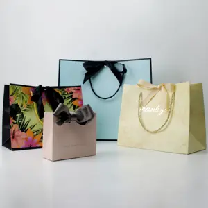 Роскошный брендовый подарочный бумажный пакет с логотипом под заказ для одежды розовая матовая Одежда бутик упаковочные сумки с ленточными ручками