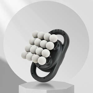 Venta al por mayor nuevo modelo superventas terapia 4 cabezas fascia pistola de mano calor y frío pistola de masaje con terapia de tejido profundo - Product Image 1