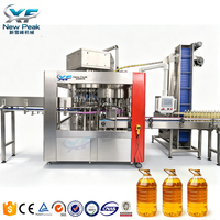 Nouvelle ligne de production entièrement automatique de remplissage d'huile, machine de remplissage d'huile comestible et d'huile d'olive